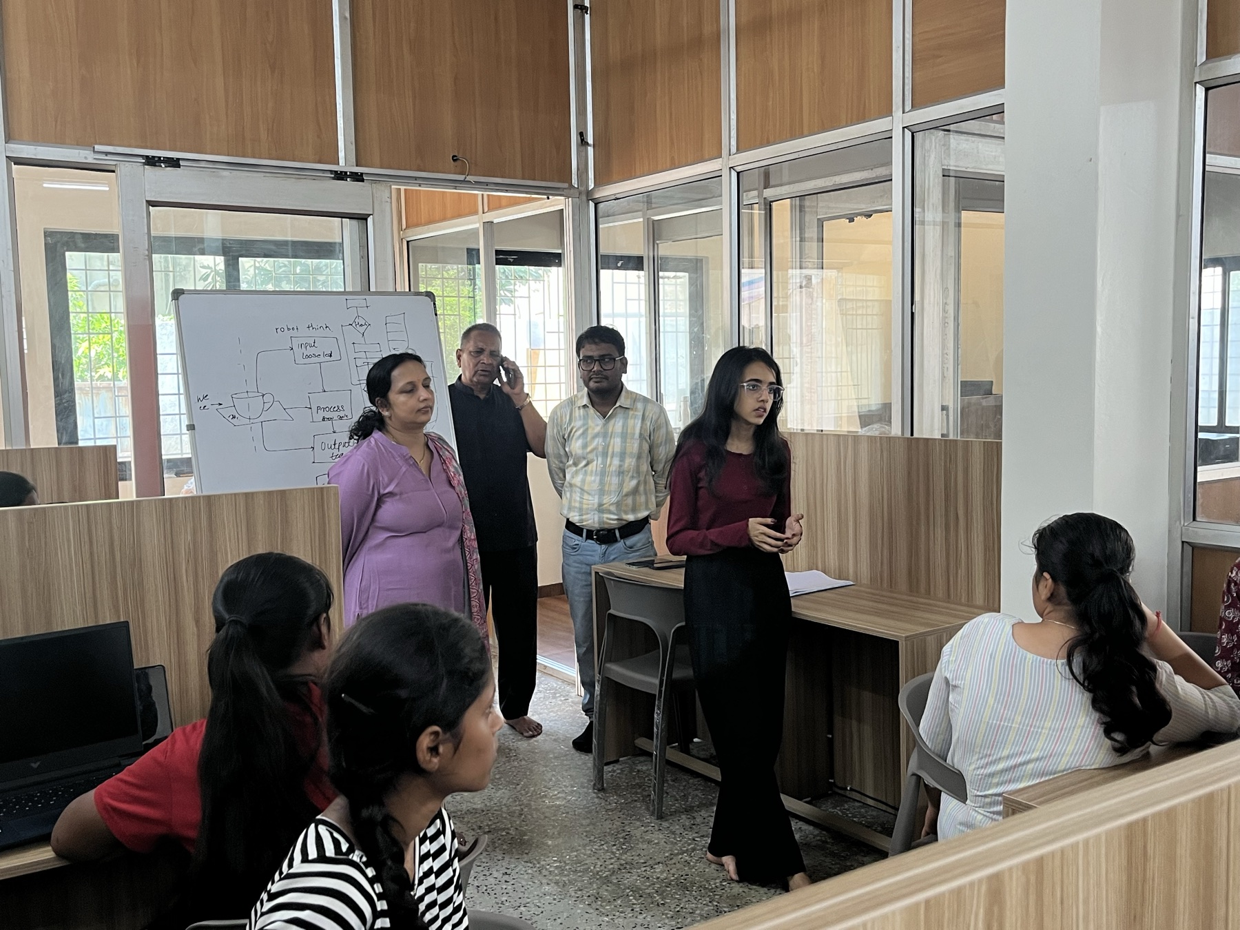 A student presenting work during the earlier learning programme